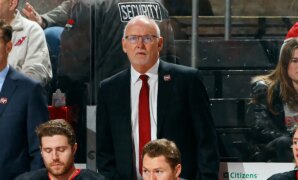 Devils coach leaves game early after taking puck to head on bench