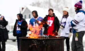 Fan lights himself on fire after jumping onto flaming table at Bills-Chiefs tailgate