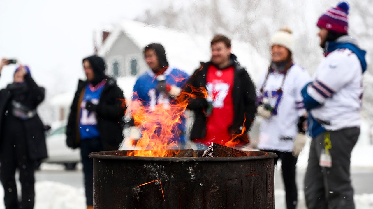 Fan lights himself on fire after jumping onto flaming table at Bills-Chiefs tailgate