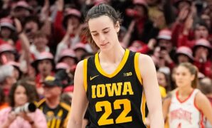 Iowa's Caitlin Clark shaken up after colliding with court-storming fan: 'Just hammered'