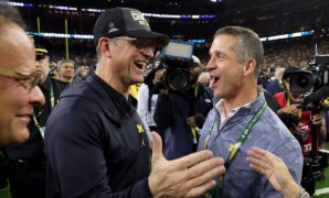 Ravens' John Harbaugh excited to compete against brother Jim Harbaugh at NFL level: 'We play them next year'