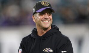 Ravens head coach John Harbaugh recites Bible verse to open press conference after playoff win