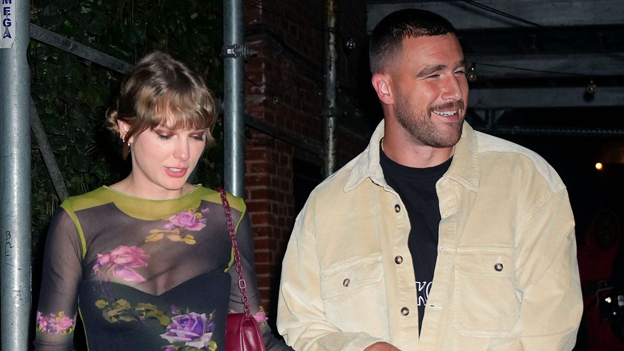 Travis Kelce, Taylor Swift share New Year’s kiss after Chiefs secure eighth consecutive division title