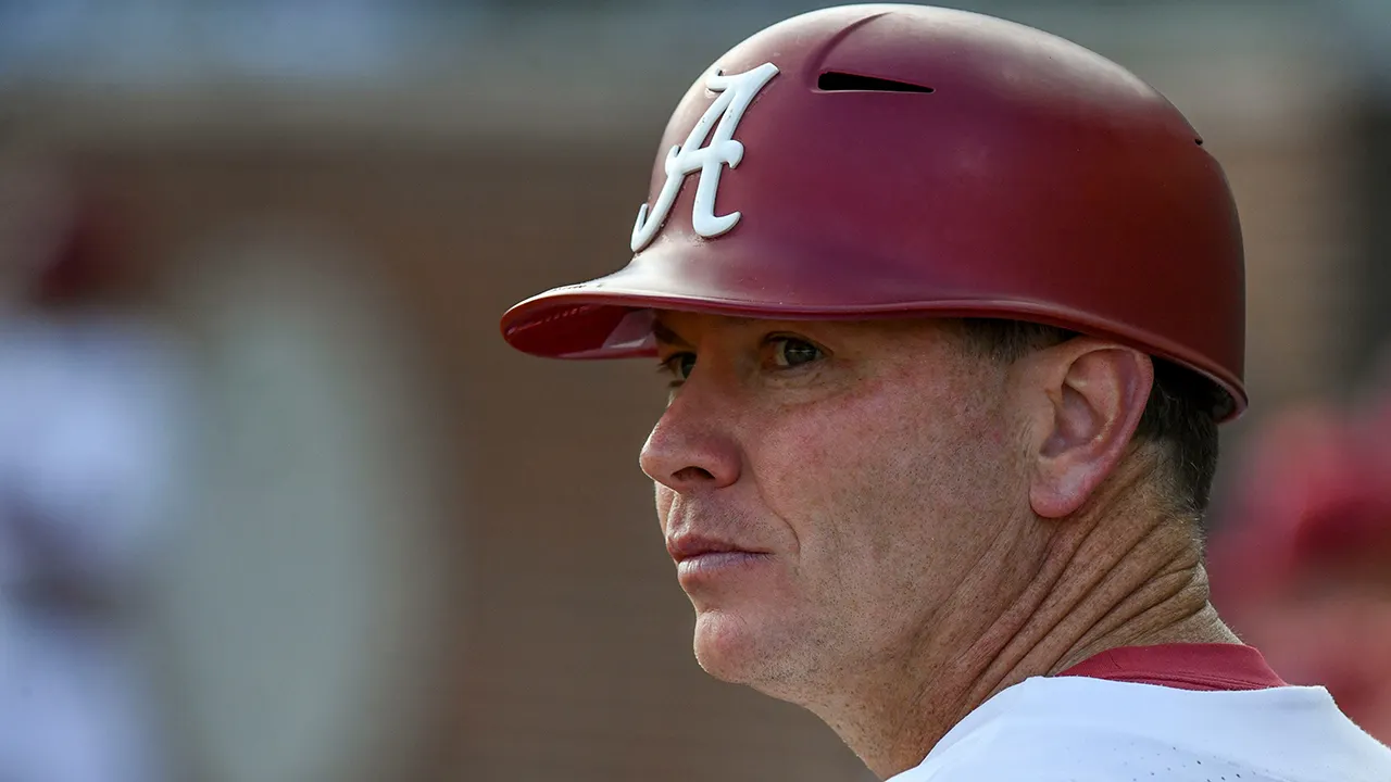 Former Alabama baseball coach slapped with 15-year ban after sports betting scandal