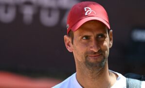 Novak Djokovic wears bicycle helmet to Italian Open training session after getting hit in the head with bottle