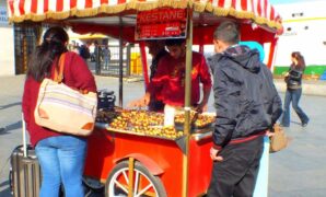 A red cart selling chestnuts in Istanbul.
