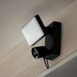 Philips hue unveils two new smart lights for your home dymera wall light and a secure floodlight camera