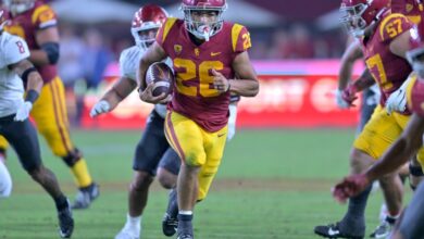 USC football team win against top-ranked rivals details