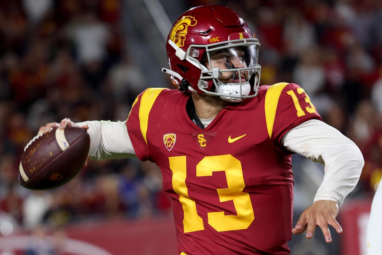 USC football team win against top-ranked rivals details